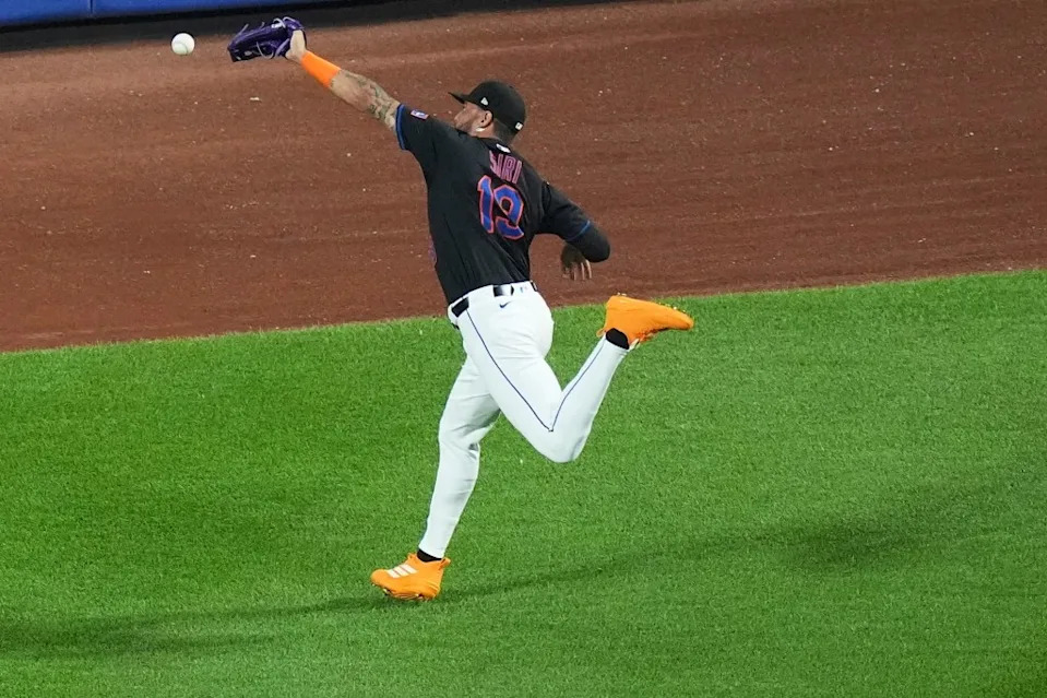 New York Mets’ Jose Siri loses control of a ball hit by Washington Nationals’ Josh Bell for an RBI double during the third inning on Sept 19, 2025. AP