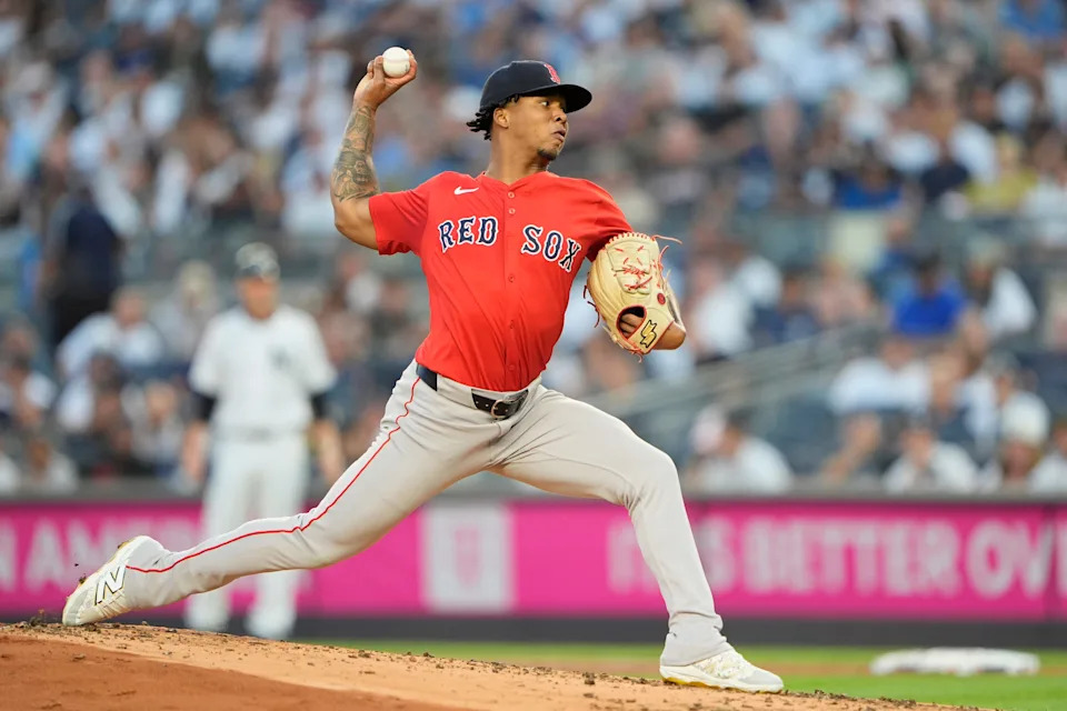 Aug 22, 2025; Bronx, New York, USA; Boston Red Sox pitcher Brayan Bello (66) delivers a pitch against the New York Yankees during the first inning at Yankee Stadium. Mandatory Credit: Gregory Fisher-Imagn Images