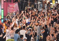 Hanshin Tigers fans celebrate in Osaka's Chuo Ward after their team clinched the Central League title on Sept. 7, 2025. (Mainichi/Takao Kitamura)
