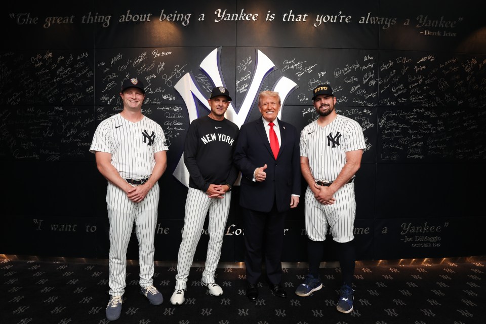New York Yankees players and manager with Donald Trump.