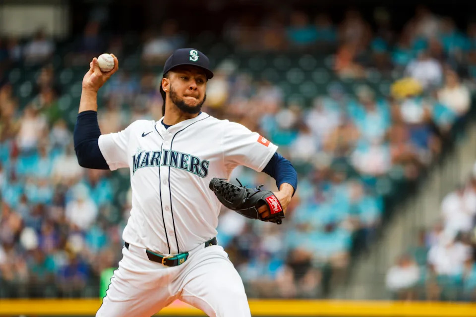 Seattle Mariners starting pitcher Luis Castillo (58) throws against the Texas Rangers during the first inning at T-Mobile Park in Seattle, Washington.