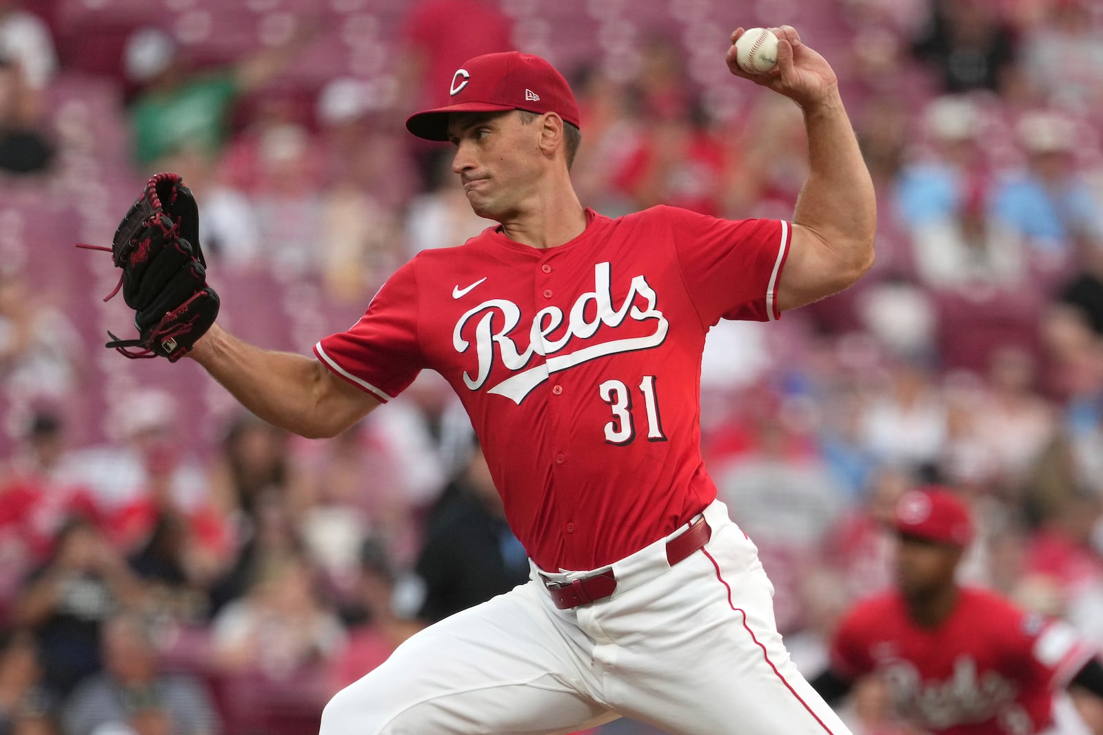 Cincinnati Reds' Brent Suter delivers a pitch in the second inning of a baseball game against the Toronto Blue Jays, Tuesday, Sept. 2, 2025, in Cincinnati. (AP Photo/Kareem Elgazzar)