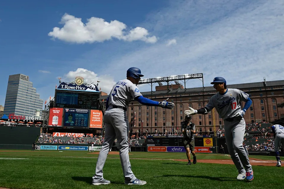 Shohei Ohtani, right, celebrates with Freddie Freeman after hitting a home run in the first inning Sunday against Baltimore.