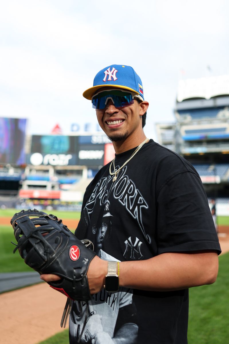 Oswaldo Cabrera #95 of the New York Yankees smiles before the game against the Detroit Tigers at Yankee Stadium on September 10, 2025 in New York