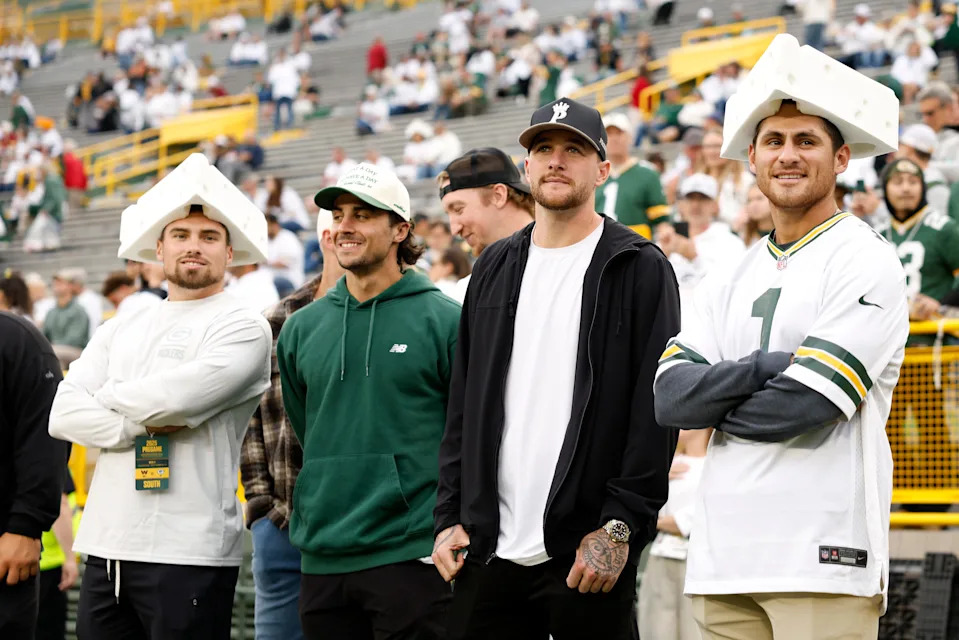 GREEN BAY, WISCONSIN - SEPTEMBER 11: (L-R) MLB players Caleb Durbin, Sal Frelick, Brice Turang and Joey Ortiz of the Milwaukee Brewers pose prior to the game between the Washington Commanders and the Green Bay Packers at Lambeau Field on September 11, 2025 in Green Bay, Wisconsin. (Photo by Michael Reaves/Getty Images)