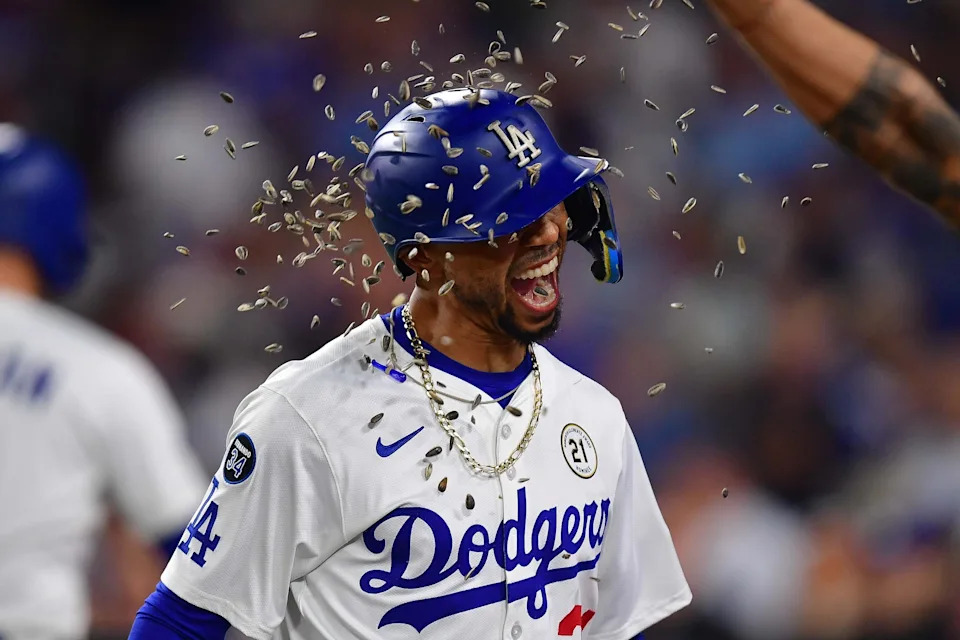 Mookie Betts and the Dodgers face the Cincinnati Reds in the NL wild card series.