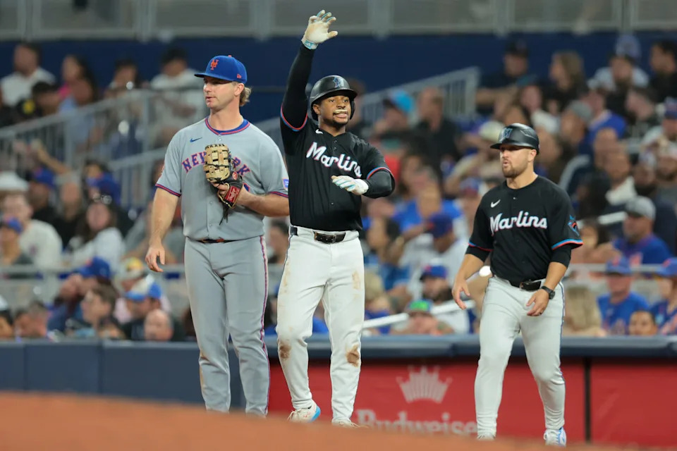 Miami Marlins second baseman Xavier Edwards (9) reacts from first base after hitting an RBI single against the New York Mets during the fifth inning on Sept. 26, 2025, at loanDepot Park