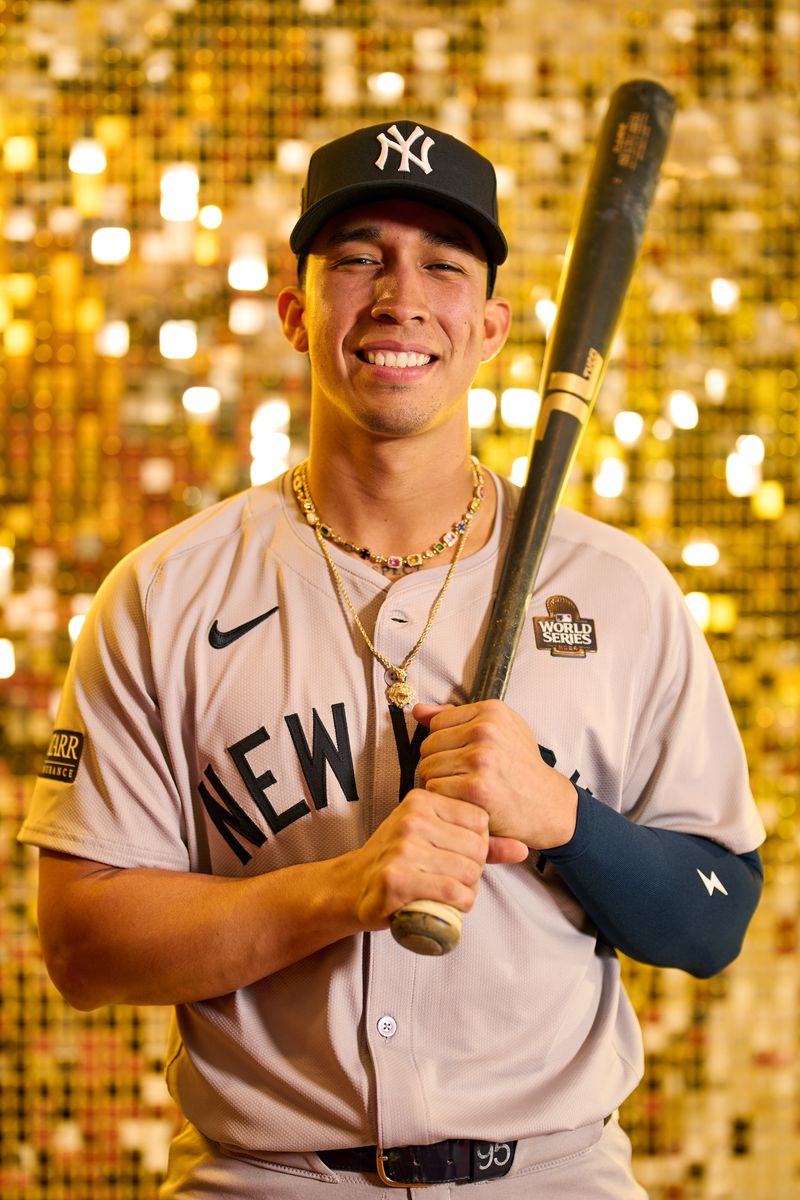 Oswaldo Cabrera #95 of the New York Yankees poses for a photo during the workout day before the 2024 World Series  at Dodger Stadium 