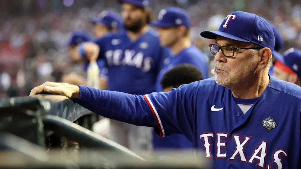 <div>PHOENIX, ARIZONA - NOVEMBER 01: Manager Bruce Bochy of the Texas Rangers looks on from the dugout in the second inning against the Arizona Diamondbacks during Game Five of the World Series at Chase Field on November 01, 2023 in Phoenix, Arizona. (Photo by Christian Petersen/Getty Images)</div>
