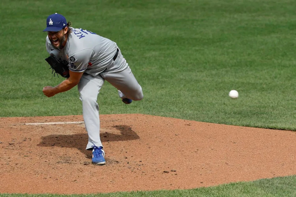 Dodgers pitcher Clayton Kershaw delivers in the third inning against the Orioles on Sunday.