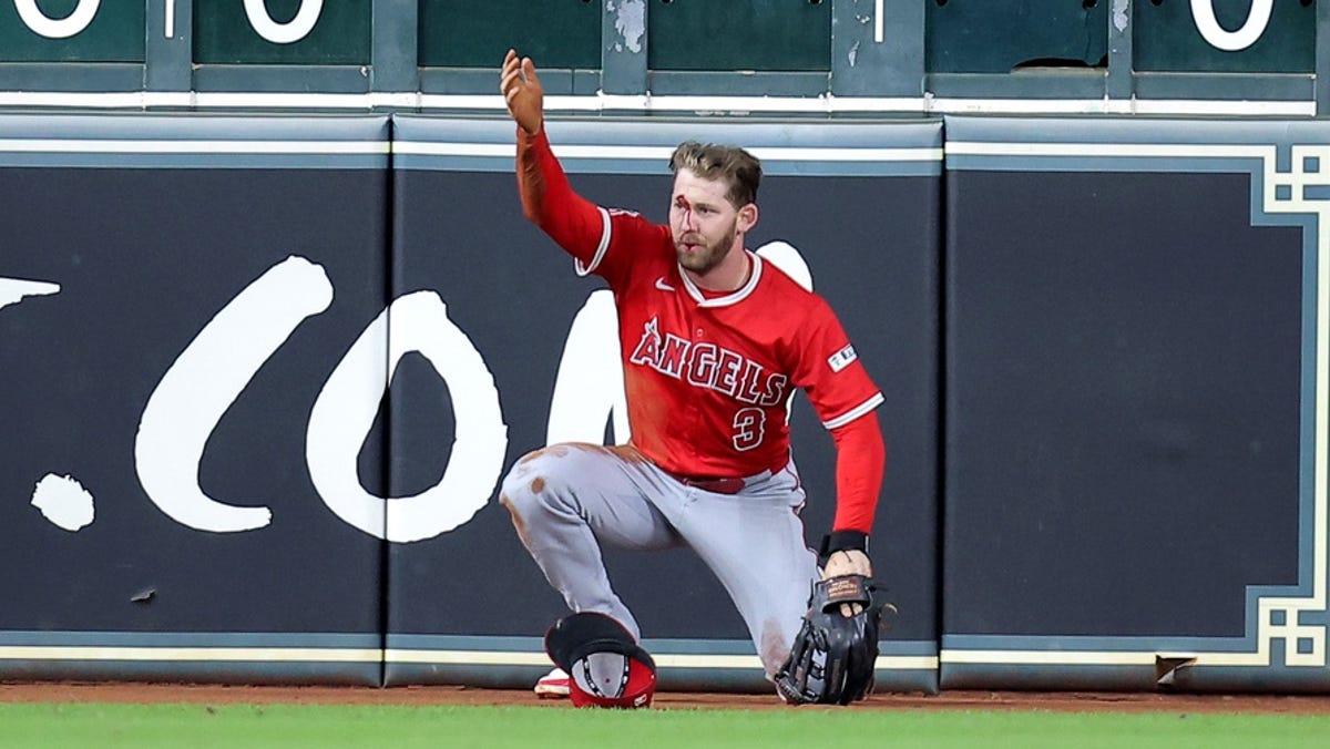 Angels' Taylor Ward runs into digital scoreboard, carted off