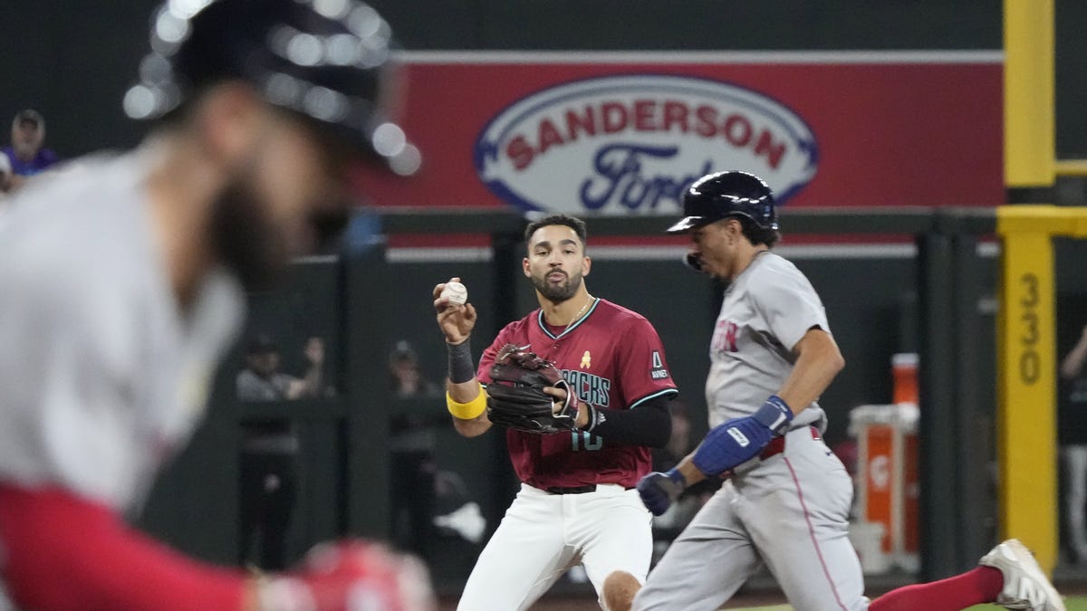 Red Sox get big two-out hits to avoid sweep by Diamondbacks