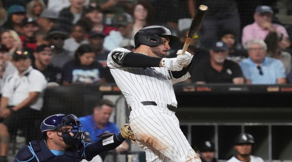 Chicago White Sox's Mike Tauchman hits a two-run double during the second inning of a baseball game against the Tampa Bay Rays in Chicago, Wednesday, Sept. 10, 2025. (AP Photo/Nam Y. Huh)