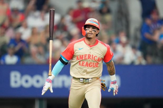 The American League's Jarren Duran, of the Boston Red Sox, flips his bat after hitting a two-run home run in the fifth inning during the MLB All-Star game, Tuesday, July 16, 2024, in Arlington, Texas. (AP Photo/Julio Cortez)