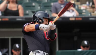 Cleveland Guardians' Steven Kwan hits a sacrifice fly during the 10th inning of a baseball game against the Chicago White Sox in Chicago, Sunday, July 13, 2025. (AP Photo/Nam Y. Huh)