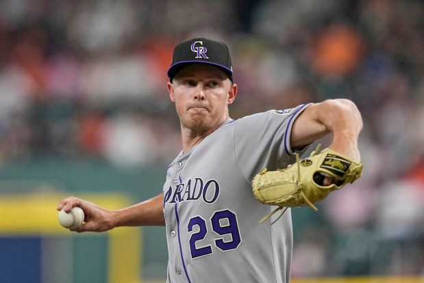 Colorado Rockies starting pitcher Tanner Gordon throws against the Houston Astros during the first inning of a baseball game Tuesday, Aug. 26, 2025, in Houston. (AP Photo/David J. Phillip)