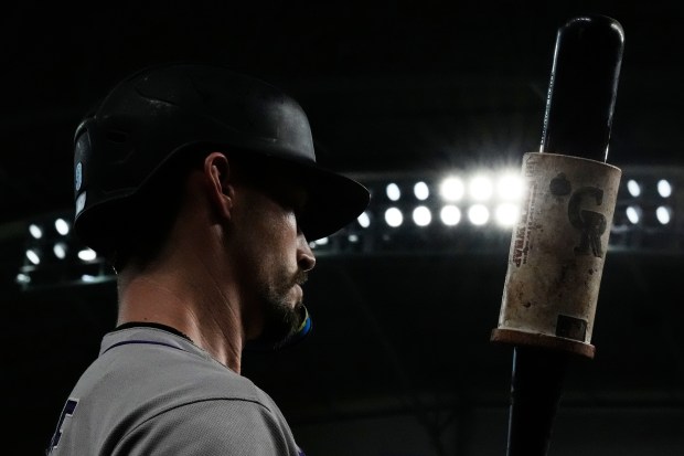 Colorado Rockies' Brenton Doyle prepares to bat during the first inning of a baseball game against the Houston Astros in Houston, Wednesday, Aug. 27, 2025. (AP Photo/Ashley Landis)