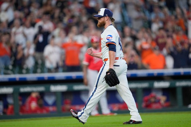 Houston Astros relief pitcher Craig Kimbrel celebrates after the final...