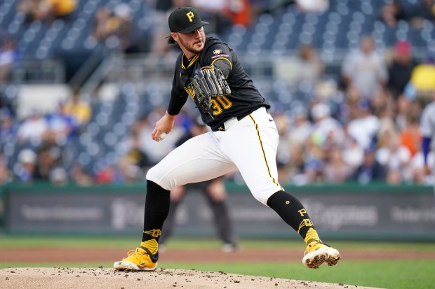 Pittsburgh Pirates pitcher Paul Skenes delivers during the first inning...