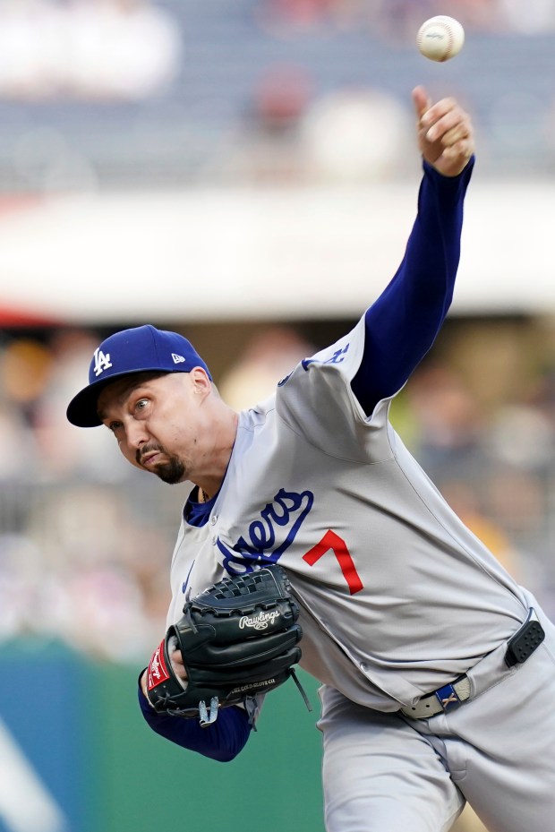 Dodgers starting pitcher Blake Snell throws to the plate during...