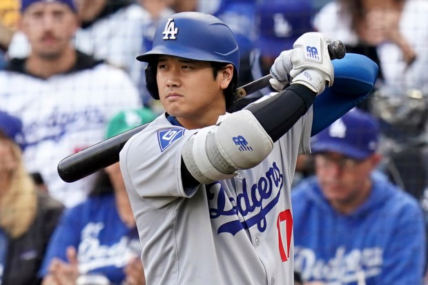 Dodgers star Shohei Ohtani prepares to bat during the first...