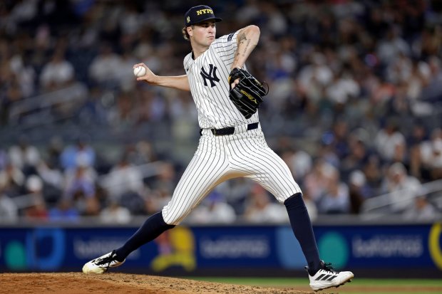 New York Yankees pitcher Cam Schlittler throws during the sixth inning of a baseball game against the Detroit Tigers, Thursday, Sept. 11, 2025, in New York. (AP Photo/Adam Hunger)