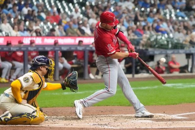 The Angels’ Carter Kieboom hits a single during the second...