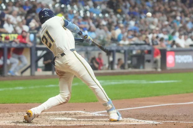 The Milwaukee Brewers’ Christian Yelich hits a two-run home run...