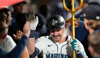 Mariners clinch AL West title, Cal Raleigh hits 60th homer and Rockies lose 115th game