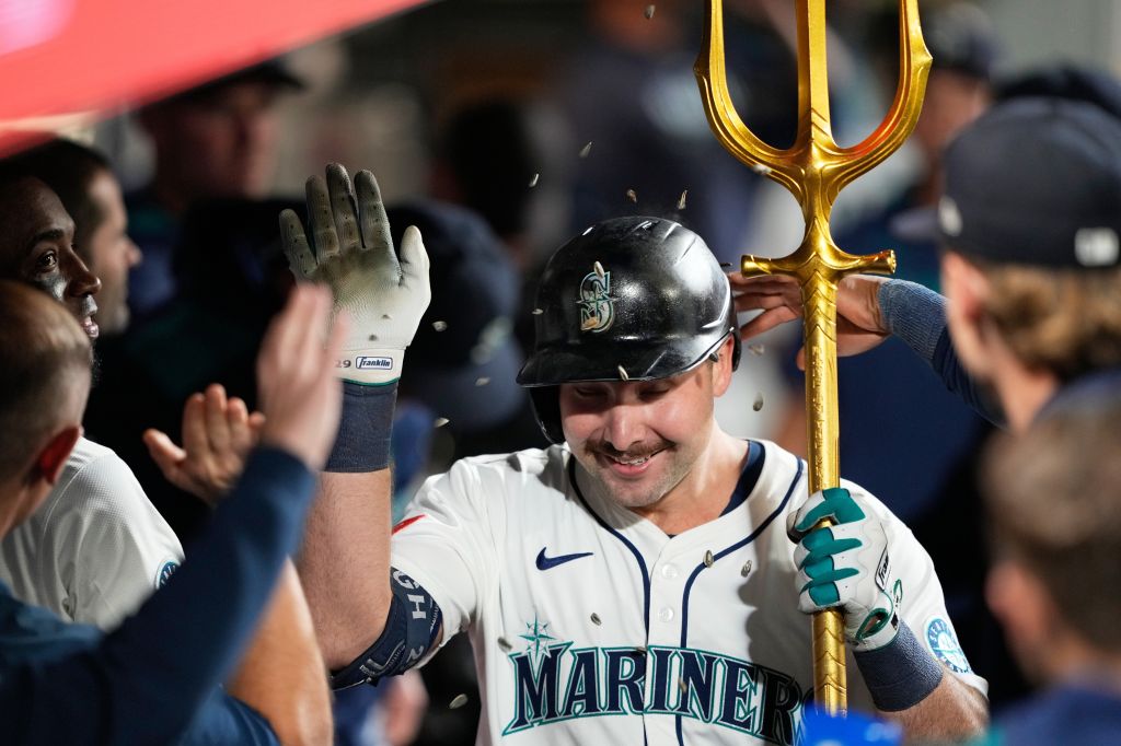 Mariners clinch AL West title, Cal Raleigh hits 60th homer and Rockies lose 115th game