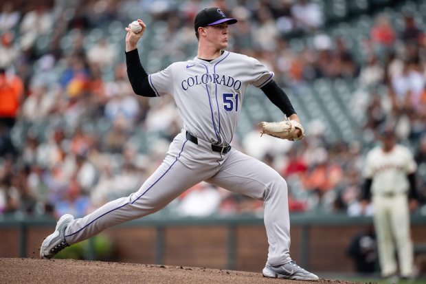 Colorado Rockies starting pitcher McCade Brown throws against the San Francisco Giants during the first inning of a baseball game Sunday, Sept. 28, 2025, in San Francisco. (AP Photo/Thien-An Truong)