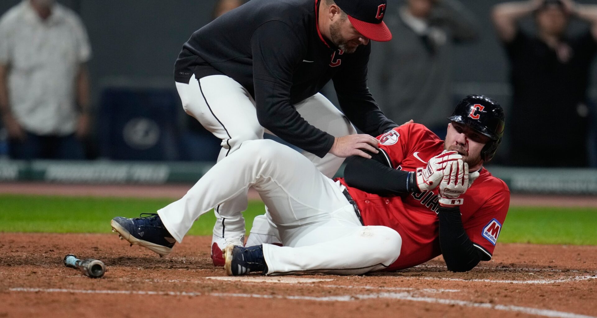 Guardians’ David Fry carted off field after being hit in face by pitch while trying to bunt