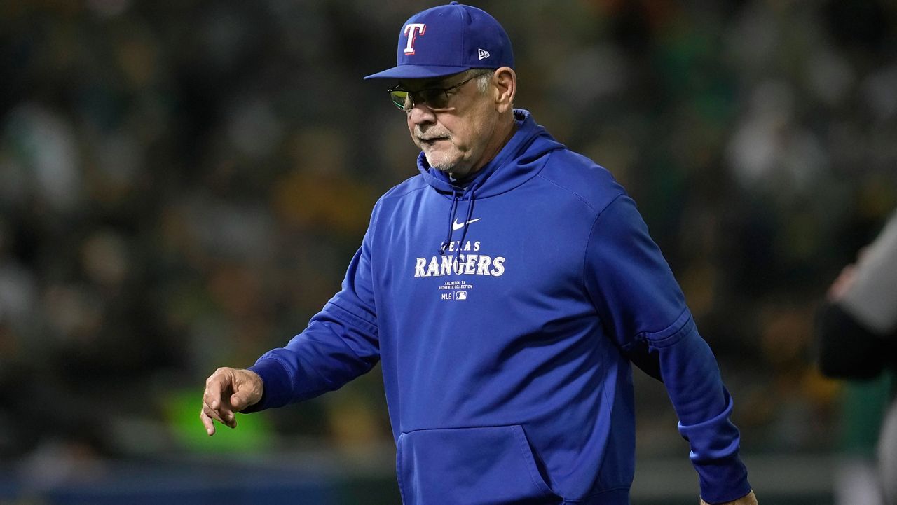 Texas Rangers manager Bruce Bochy walks to the dugout after making a pitching change during the fourth inning of a baseball game against the Oakland Athletics in Oakland, Calif., Wednesday, Sept. 25, 2024. (AP Photo/Jeff Chiu)