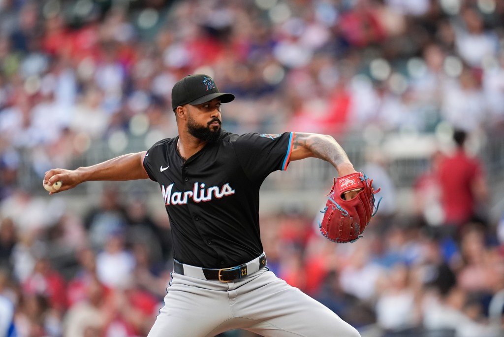 Marlins baseball pitcher throwing a pitch.