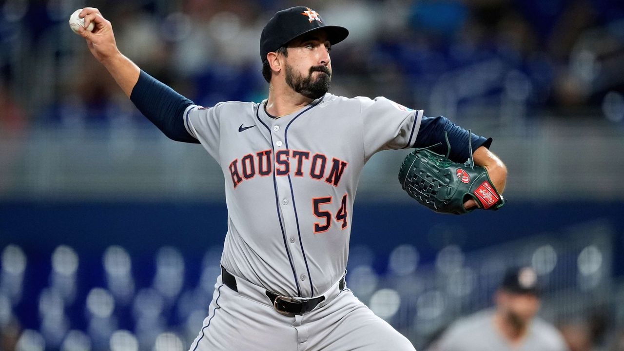 Houston Astros starting pitcher Jason Alexander (54) pitches in the first inning of a baseball game against the Miami Marlins, Monday, Aug. 4, 2025, in Miami. (AP Photo/Rebecca Blackwell)