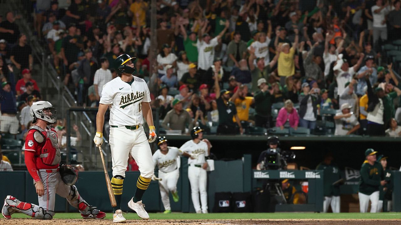 Cincinnati Reds pitcher Brady Singer throws to the Athletics during the first inning of a baseball game Friday, Sept. 12, 2025, in West Sacramento, Calif.