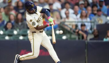 Milwaukee Brewers' Andruw Monasterio hits an RBI single during the third inning of a baseball game against the Arizona Diamondbacks, Monday, Aug. 25, 2025, in Milwaukee.