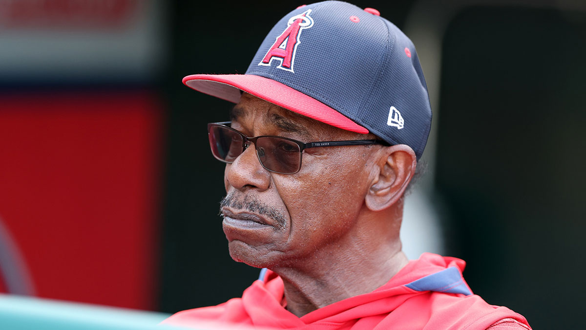 Los Angeles Angels manager Ron Washington (37) watches batting practice from a dugout before the game against the Houston Astros at Angel Stadium. Washington is stepping indefinitely away from the team due to health reasons.