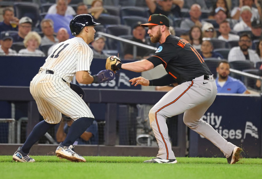 Anthony Volpe, who has played better recently since receiving a cortisone shot on his left shoulder, gets thrown out in a rundown after  trying to steal home in  the sixth inning of the Yankees' 8-4 win over the Orioles on Sept. 26, 2025.