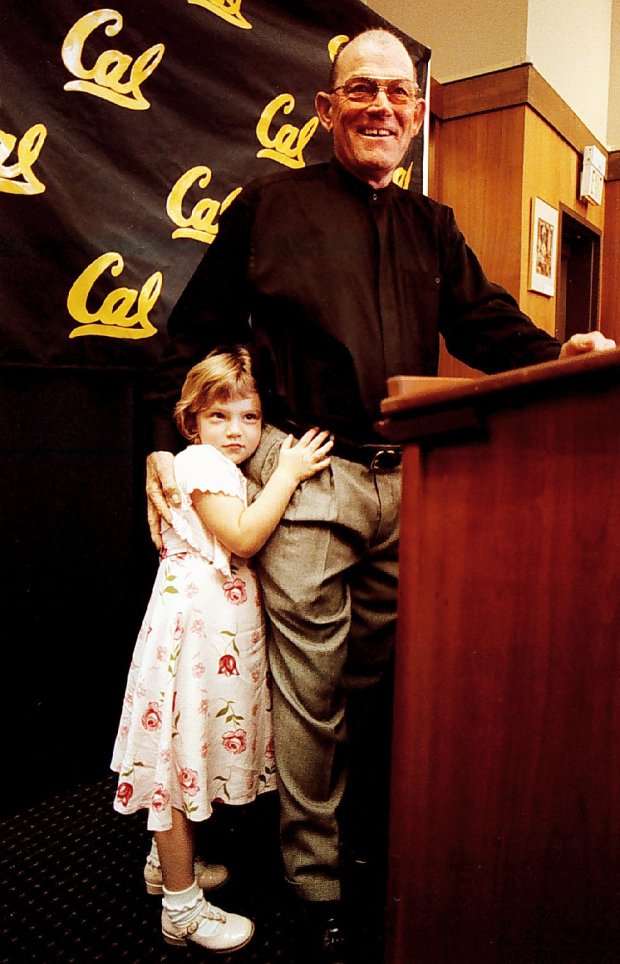 In May of 1999, Bob Milano speaks at a press conference where he announces his retirement as a Cal baseball coach. At the end, his daughter Gina (5) rushed up to give him a hug. (Nick Lammers/ Staff Archives)