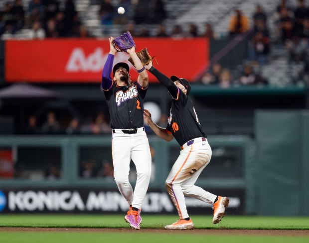 San Francisco Giants' Willy Adames (2) makes a catch in...