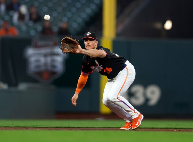 San Francisco Giants' Matt Chapman (26) makes a catch for...