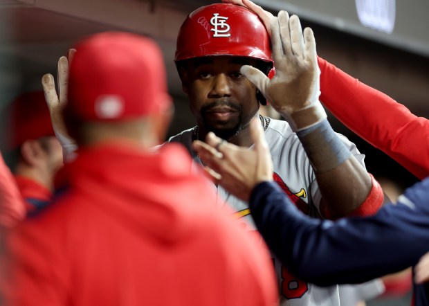 St. Louis Cardinals’ Jordan Walker #18 is congratulated by teammates...