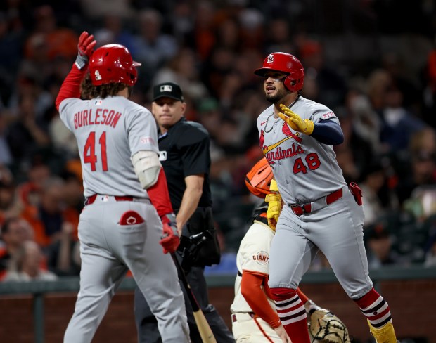 St. Louis Cardinals’ Iván Herrera #48 is congratulated by Alec...