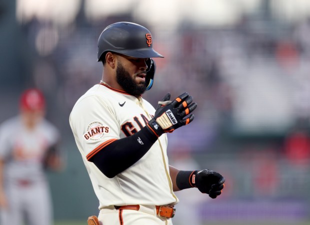 San Francisco Giants' Heliot Ramos #17 gestures as he crosses the plate after hitting a solo home run off St. Louis Cardinals starting pitcher Michael McGreevy #36 in the first inning of their MLB game at Oracle Park in San Francisco, Calif., on Monday, Sept. 22, 2025. (Jane Tyska/Bay Area News Group)