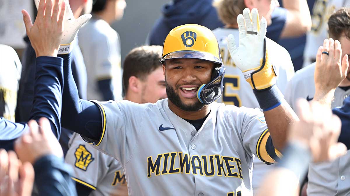 Milwaukee Brewers center fielder Jackson Chourio (11) celebrates with team mates in the duout after hitting a solo home run against the Toronto Blue Jays in the ninth inning at Rogers Centre.