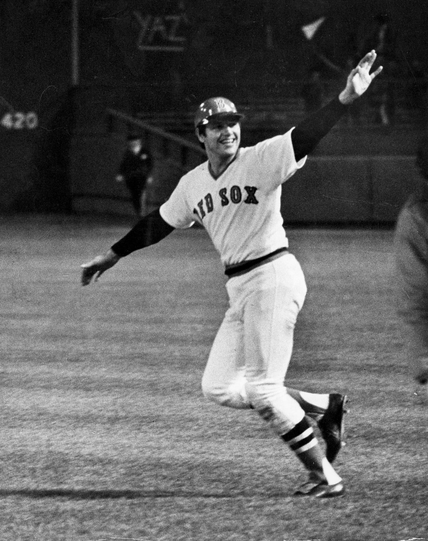 Red Sox catcher Carlton Fisk smiled after he willed his home run fair for a walk-off win in the 12th inning of Game 6.