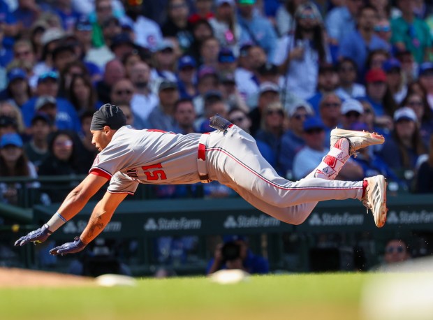 Washington Nationals outfielder Daylen Lile (51) slides safely into third after hitting a triple off of Chicago Cubs pitcher Daniel Palencia (48) at Wrigley Field on Sept. 7, 2025, in Chicago. Lile went two for four. (Stacey Wescott/Chicago Tribune)
