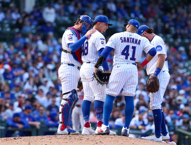 Chicago Cubs inielders gather around closer Daniel Palencia (48) in the top of the ninth inning at Wrigley Field on Sept. 7, 2025, in Chicago. Palencia blew the save and the Cubs lost 6-3. (Stacey Wescott/Chicago Tribune)