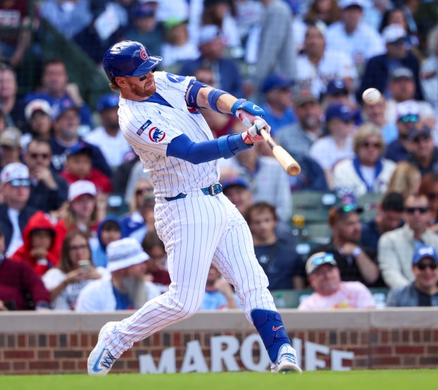 Chicago Cubs catcher Carson Kelly (15) hits his second home run of the game against the Washinton Nationals at Wrigley Field on Sept. 7, 2025, in Chicago. (Stacey Wescott/Chicago Tribune)